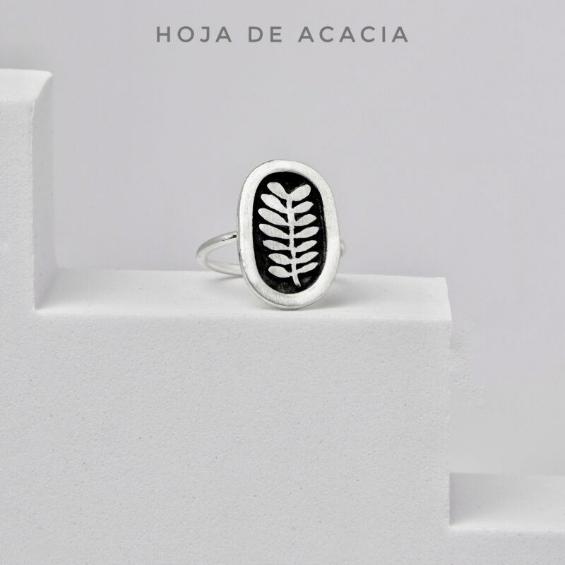 a ring on a white podium