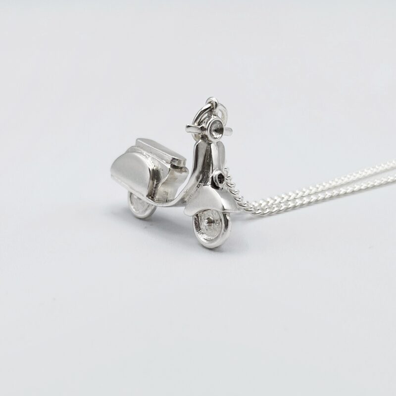 a silver scooter necklace