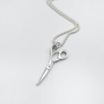 a silver scissors necklace