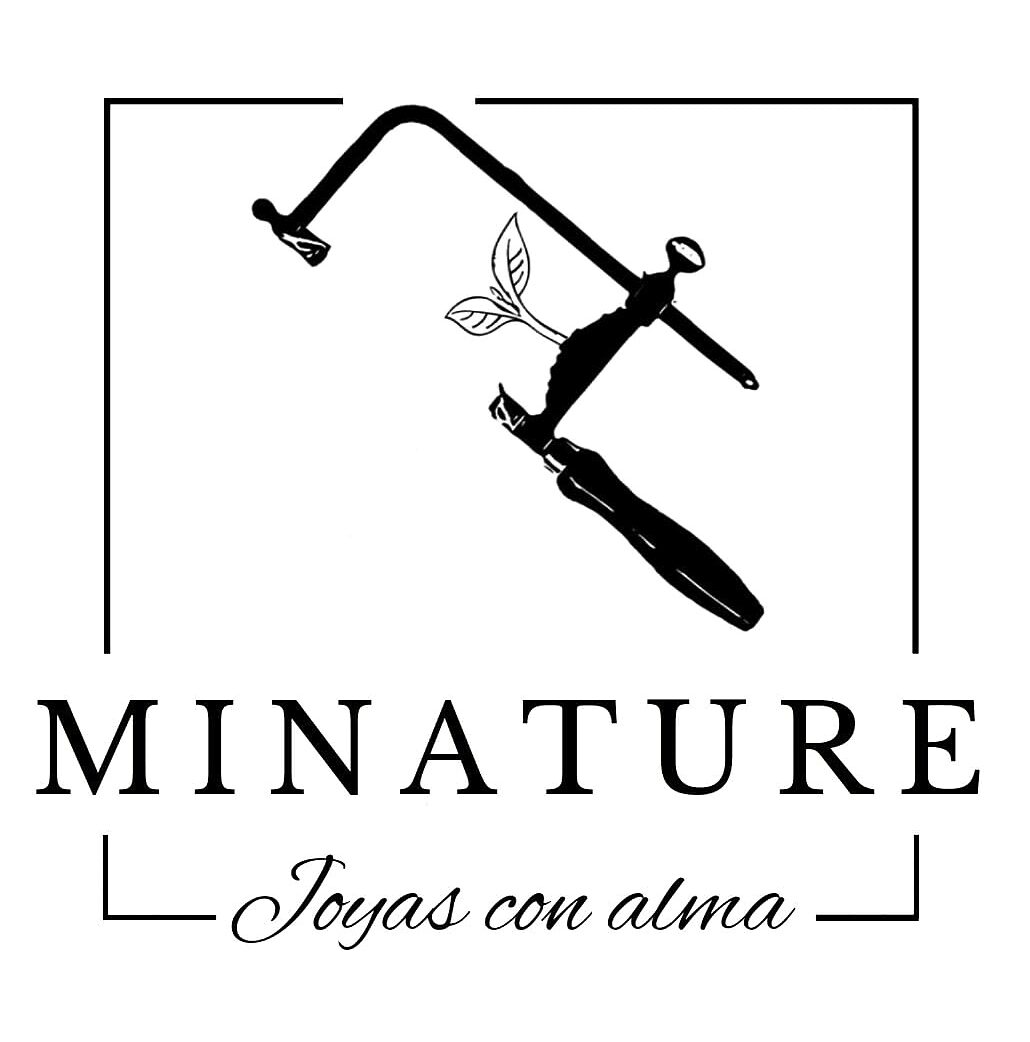 a black and white logo with a black handle and a leaf